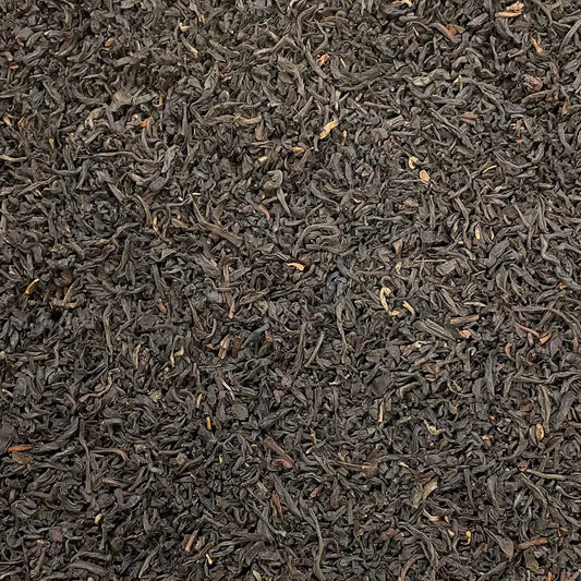 Loose leaf Scottish Breakfast Tea by High Teas, showcasing dark tea leaves in a natural, close-up view.