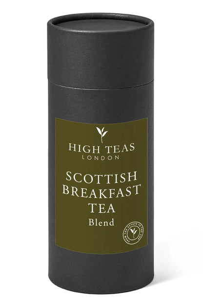 Loose leaf Scottish Breakfast Tea by High Teas in a clear tea tin, showcasing dark tea leaves for a robust morning brew.