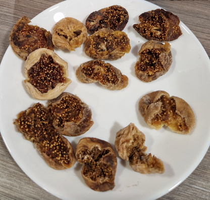 Dried baby figs snack from Whole Food Earth, close-up of small, dried, sweet figs with natural texture on a neutral background.