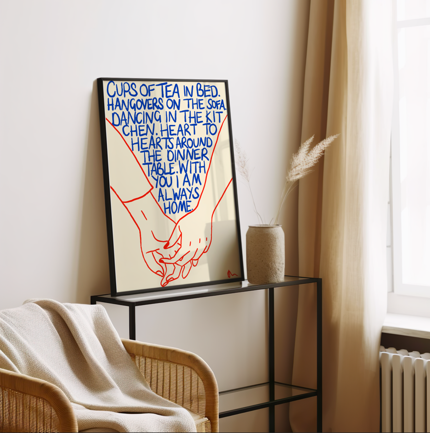 Colorful cups of tea in bed with blue and orange print on a cozy setting, featuring a romantic and cute design by Peak Prints.