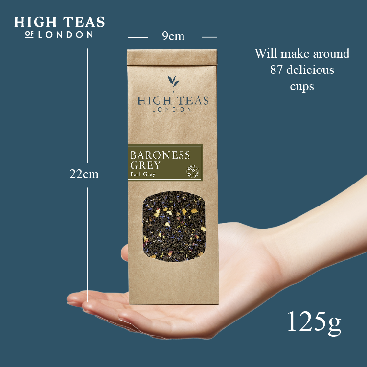 High Teas Baroness Grey Blend loose leaf tea in a clear glass jar with grey and silver packaging, showcasing the tea leaves.