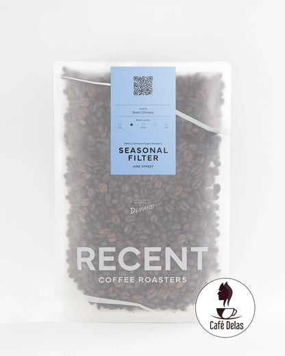 Recent Beans Aire Street Blend Light Medium Roast Coffee in seasonal packaging, featuring fresh roasted coffee beans.