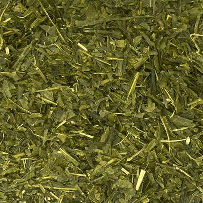 Japanese Sencha green tea leaves in a clear glass jar, showcasing fresh, vibrant green tea from Porter Hill Tea Company.