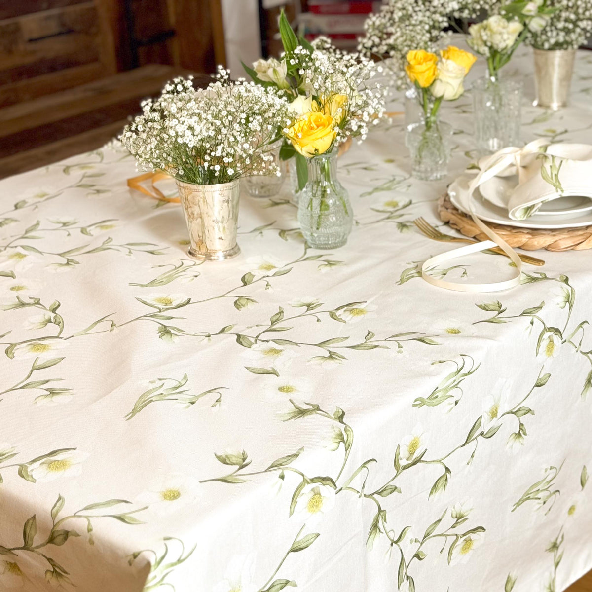 Snowdrop and hellebore floral tablecloth by Avalon Home UK featuring delicate winter flower patterns on fabric.