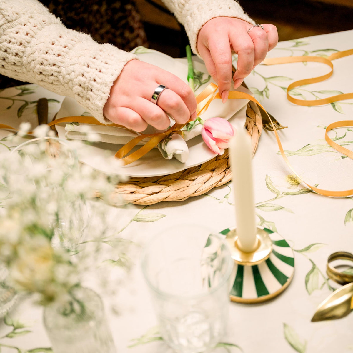 Snowdrop and hellebore floral tablecloth by Avalon Home UK featuring delicate winter flowers on fabric surface.