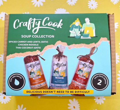 Crafty Cook Soup Collection featuring three 2-serving meal containers with colorful labels and fresh ingredients.