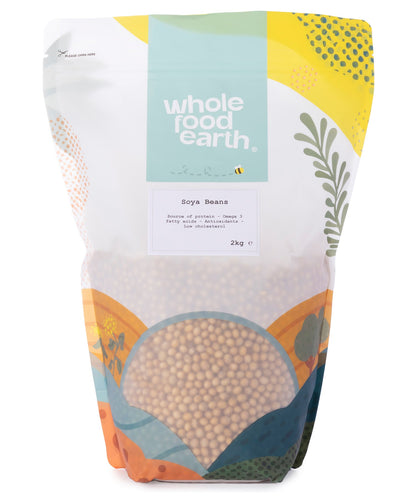 Whole Food Earth soy beans in a 2kg bag, showing fresh, light tan soy beans used in cooking and pulses.