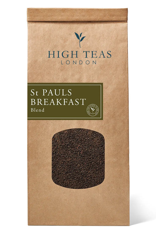 Loose leaf tea called St Pauls, A Fine London Breakfast Blend by High Teas, displayed in a clear glass teapot with tea leaves inside.