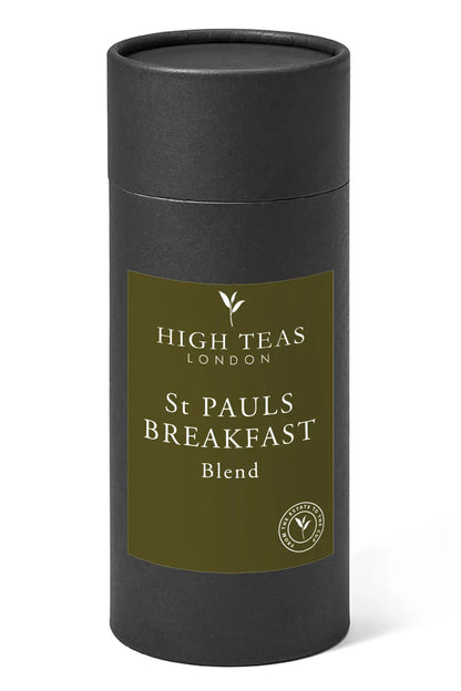 Loose leaf tea in a tin labeled St Pauls, A Fine London Breakfast Blend by High Teas, with tea leaves and packaging visible.