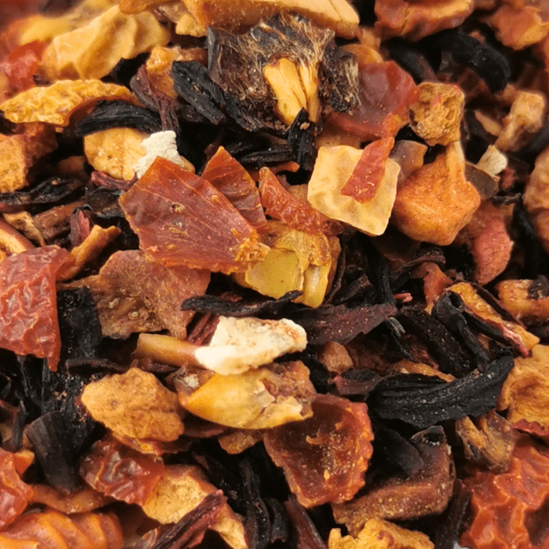 Porter Hill Tea Company Strawberry Kiwi fruit and herbal tea blend with fresh strawberries and kiwi slices in a clear teapot