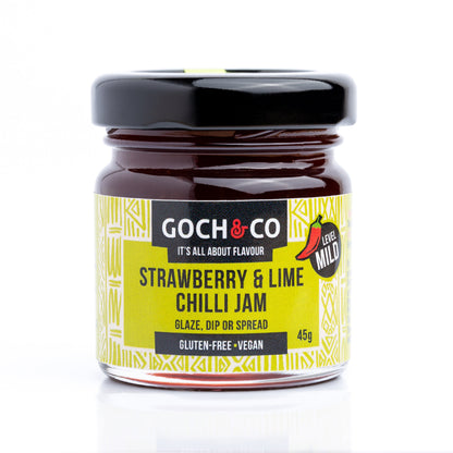 Goch & Co Strawberry & Lime Chilli Jam jar with vibrant fruit and chili ingredients, showcasing a colorful spread of the spicy sweet jam.