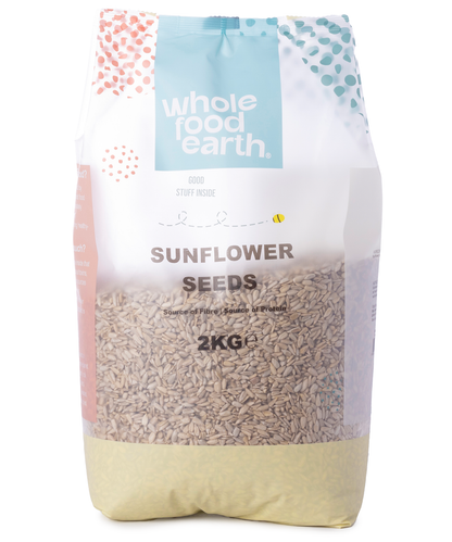 Whole Food Earth sunflower seeds in a 2kg bag, a nutritious nut and seed snack with bright sunflower seed shells.