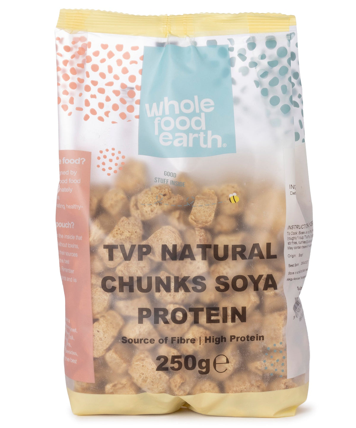 Cooked TVP natural soy protein chunks from Whole Food Earth, displayed in a clear bowl with a textured surface.