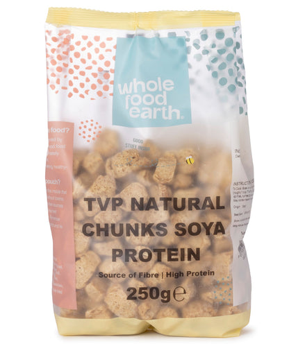 Cooked TVP natural soy protein chunks from Whole Food Earth, displayed in a clear bowl with a textured surface.