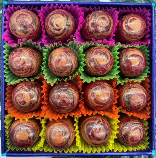 Gorvett & Stone Temple Island Rum Caramel chocolate gift box with milk chocolates and caramel filling, elegantly packaged.