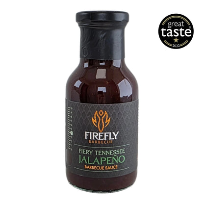Bottle of FireFly Barbecue Tennessee Jalapeño BBQ Sauce with a label, highlighting the spicy, flavorful sauce for grilling and dipping.