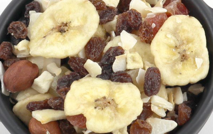 Assorted dried fruits and nuts from Whole Food Earth Tropical Mix, showcasing colorful tropical fruit pieces and crunchy nuts.