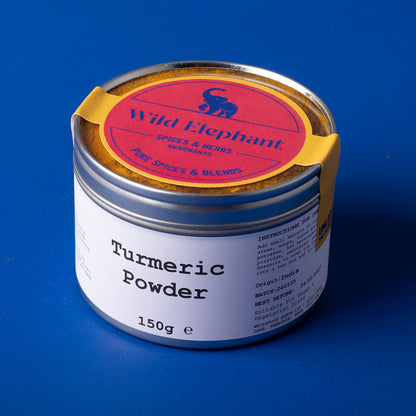 Organic turmeric powder from Wild Elephant in a 150g package, part of Whole Food Earth herbs and spices collection.