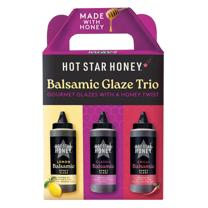 Hot Star Honey Balsamic Glaze Trio gift set featuring three small glass bottles with dark, glossy balsamic glazes on a white background.