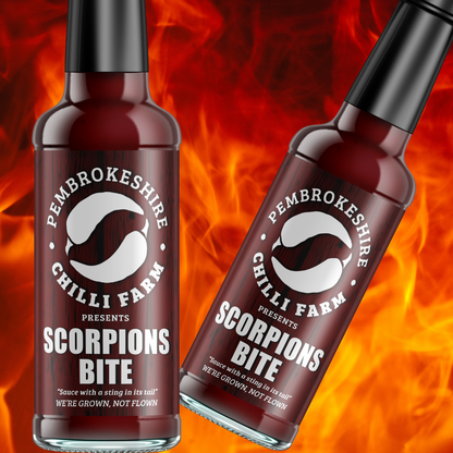 Pembrokeshire Chilli Farm hot sauce gift box with three hot chilli sauces in vibrant bottles, ideal for spicy food lovers.