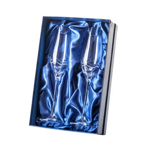 Set of Glassware UK diamond-etched champagne flutes with elegance spiral cutting in a gift box, perfect for celebrations.