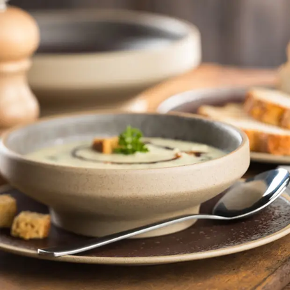 Glassware UK 7-inch truffle plate with a smooth ceramic surface and elegant design, ideal for serving small treats.