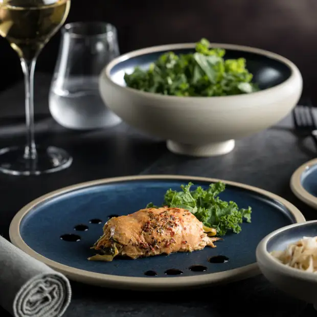 Glassware UK 7-inch ink plate with a smooth, round ceramic surface in a simple, elegant design for artistic or decorative use.