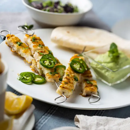 Glassware UK Manna 11.5-inch ceramic plate with a smooth, white finish, perfect for serving and dining.