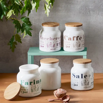 Bormioli Rocco Vitoriana 1L glass storage jar with a clear glass body and metal lid for kitchen organization.