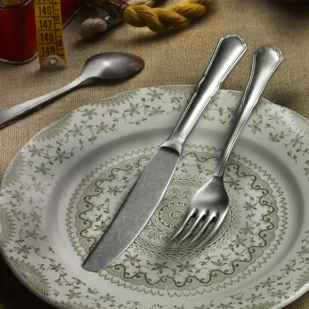 Glassware UK Pintinox Settecento stone-washed table knife, stainless steel cutlery with a sleek, modern design, shown on a plain background.