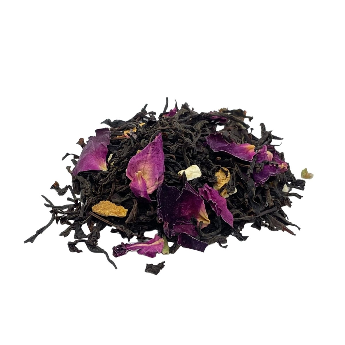 Box of Camellios Earl Grey tea and infusions with tea leaves and citrus slices on a rustic wooden surface.