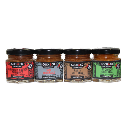 Goch & Co Goch Chilli Sauces gift set with various colorful bottles and labels, perfect for spicy condiment lovers.