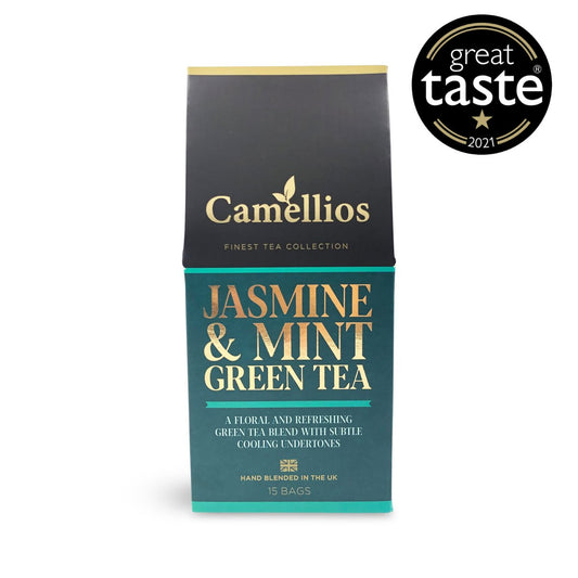 Camellios Jasmine & Mint Green Tea in a tea infusions box with fresh jasmine flowers and mint leaves.