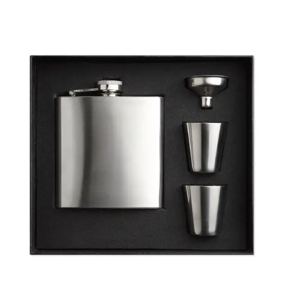 Glassware UK hip flask gift set with stainless steel flask, cups, and accessories for stylish gift presentation.