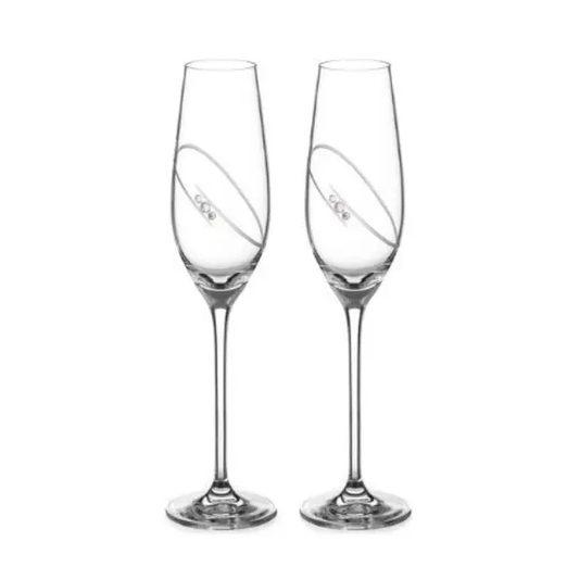 Set of two Glassware UK champagne flutes with orbital design, displayed in a gift box, perfect for special occasions.