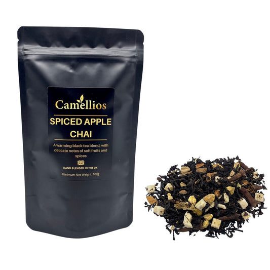 Loose leaf Spiced Apple Chai tea from Camellios, featuring aromatic spices and dried apple pieces in a natural blend.