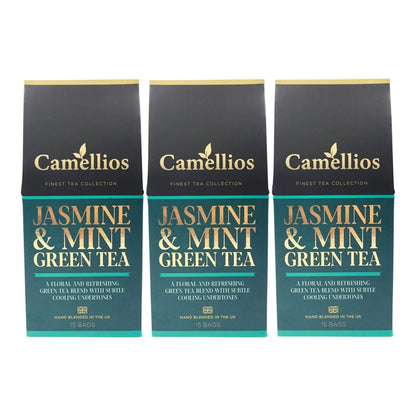 Camellios Jasmine and Mint Green Tea in a clear glass teapot with fresh mint leaves and jasmine flowers for infusion.