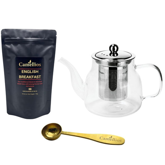 Camellios loose leaf tea set with various tea infusions, featuring a selection of colorful tea leaves and brewing accessories.