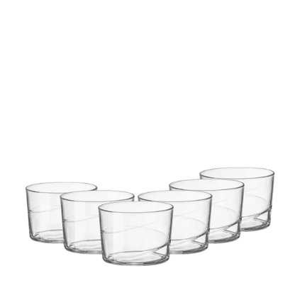 Set of six Bormioli Rocco Swirl mini whisky tumblers with clear glass and swirling pattern, ideal for serving spirits.