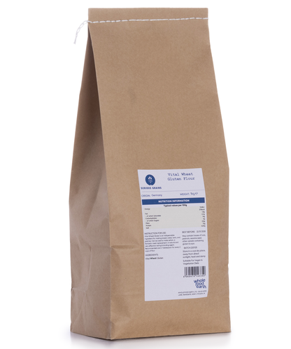 Vital wheat gluten flour from Serious Grains by Whole Food Earth, 1kg package, showing the flour's fine, beige powder texture.