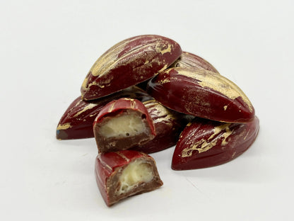 Gorvett & Stone whisky chocolate gift box with assorted chocolate pods displayed in an elegant landscape arrangement.