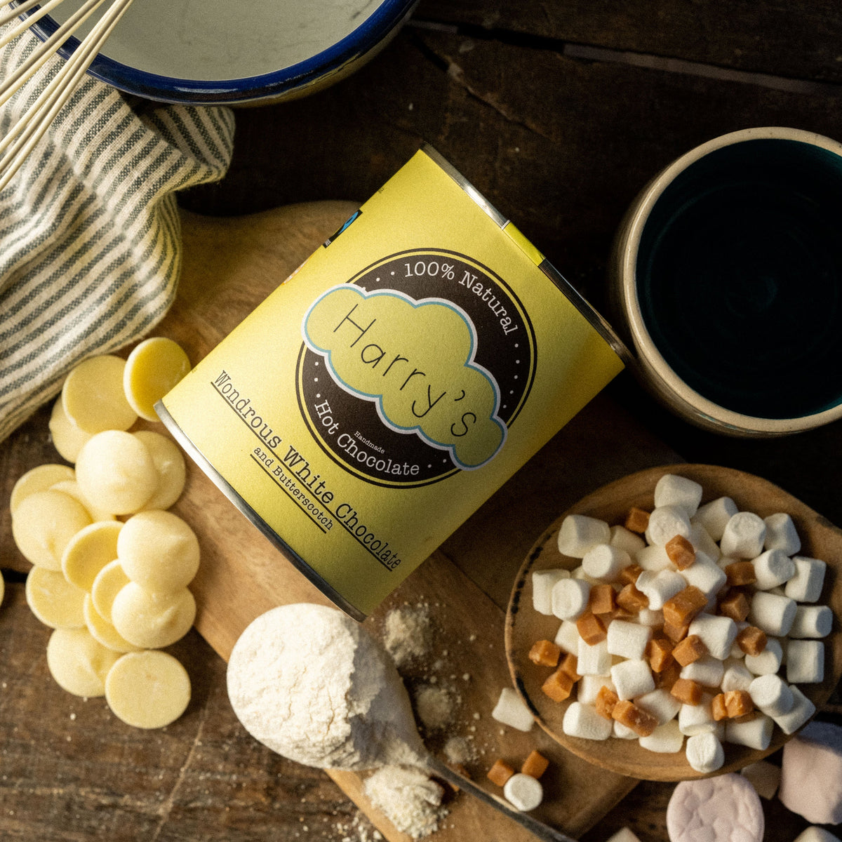 White tin of Harry's Hot Chocolate 30% hot chocolate powder, shown in a lifestyle setting with the tin visible.