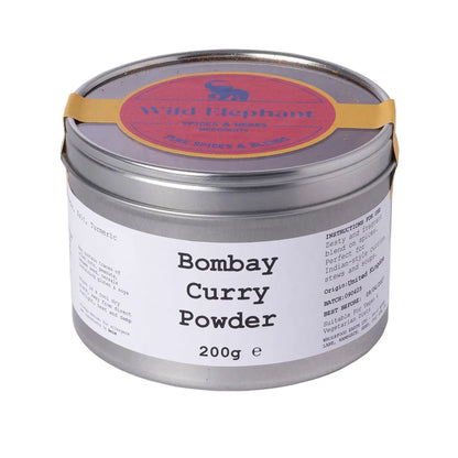 Wild Elephant Bombay Curry Powder in a jar, vibrant yellow spice blend for Indian cuisine, from Whole Food Earth.