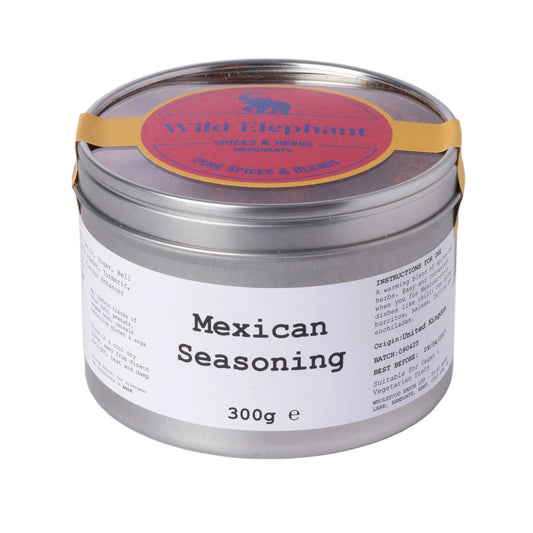 Wild Elephant Mexican seasoning by ArtisanBox in a spice jar with colorful herbs and spices visible inside.