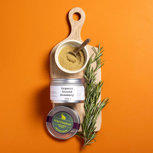 Organic ground rosemary from Wild Elephant, 100g, in a clear jar, showcasing fresh, dried rosemary leaves for herbs and spices.