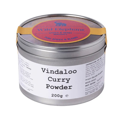 Wild Elephant Vindaloo Curry Powder in a spice jar, used for seasoning Indian dishes, from Whole Food Earth brand.