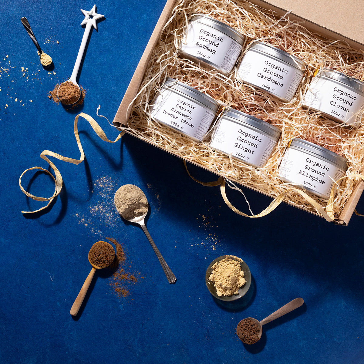Organic winter spice box by Wild Elephant featuring assorted herbs and spices in a Whole Food Earth package.