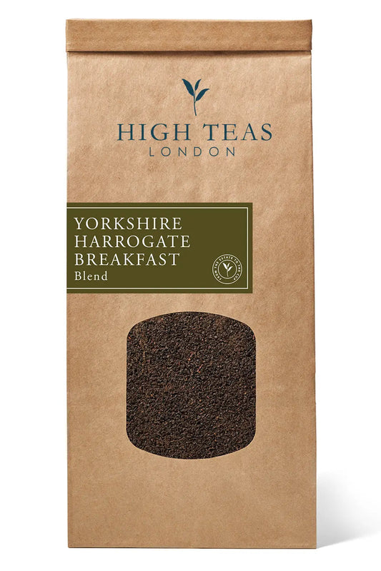 Loose leaf Yorkshire Harrogate Breakfast Brew tea by High Teas, showing rich tea leaves in a clear jar.