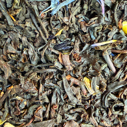 Loose leaf Yorkshire Fog Earl Grey black tea from Porter Hill Tea Company, showcasing fragrant grey tea leaves in a clear container.