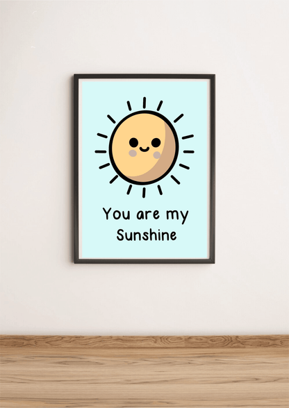 Blue "You Are My Sunshine" print by KEOLIX featuring vibrant lettering on textured paper.